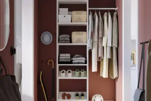 Neatly designed closet fixture with one hanging rod and 5 shelves